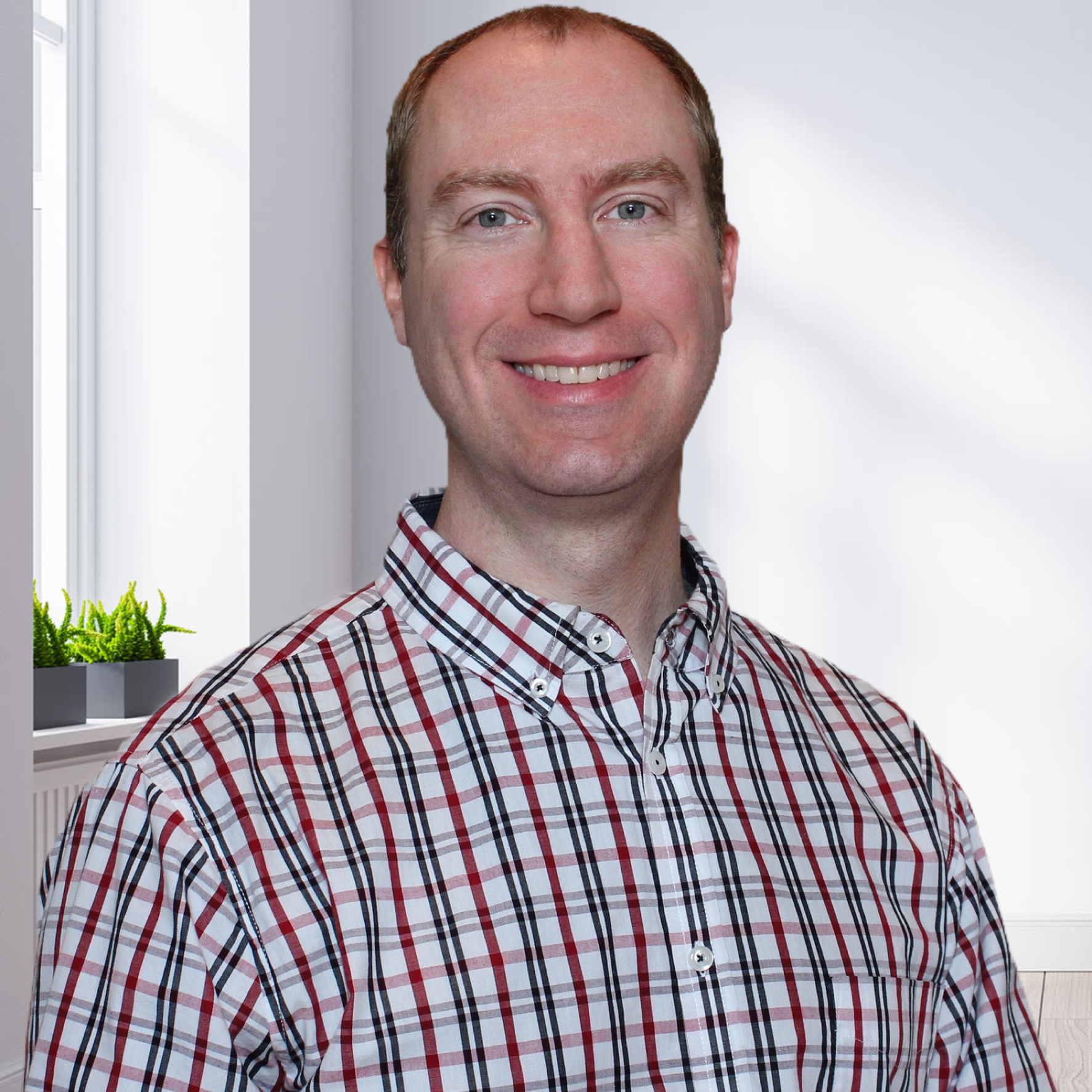 A professional portrait of Dr. Brandon Santan, website owner.